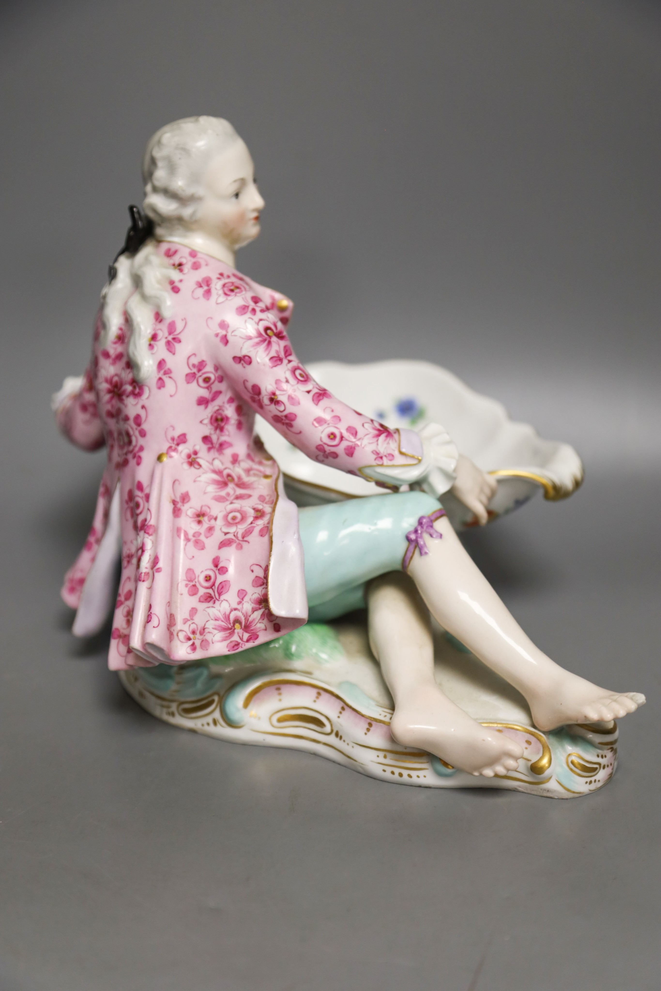 A 19th century Meissen figural sweetmeat dish, incised number 2863 30cm